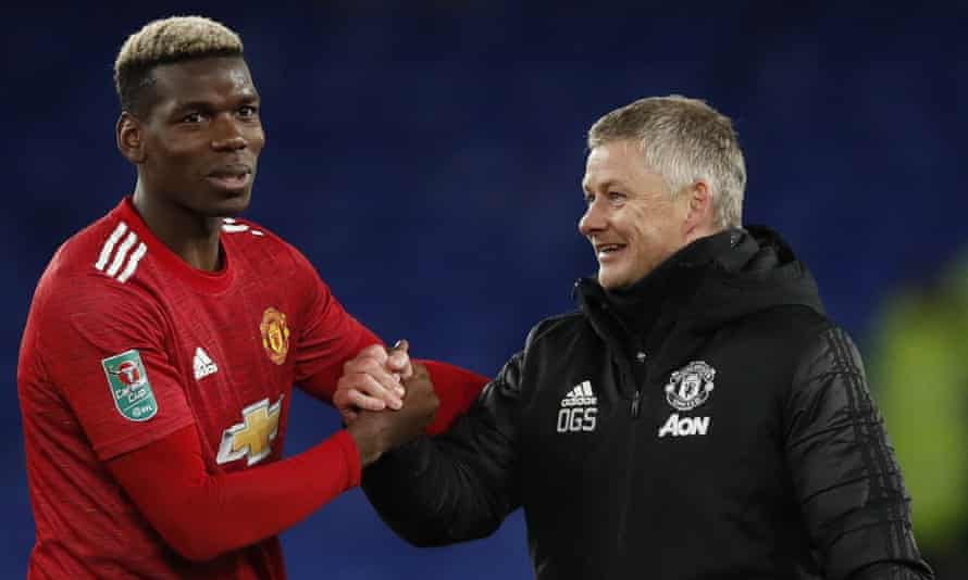 Paul Pogba (left) and the Ole Gunnar Solskjær celebrate a victory at Everton.