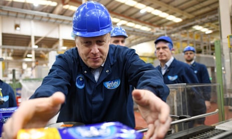Boris Johnson on the production line of the Tetley tea factory in Stockton while on the general election campaign trail. 