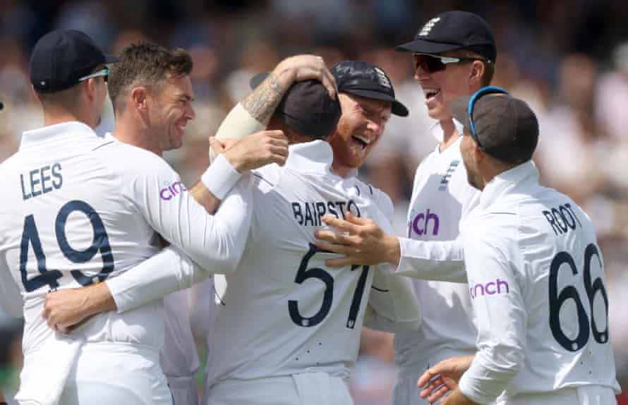 England’s Jonny Bairstow is hugged by his captain Ben Stokes and congratulated by his team-mates, including Jimmy Anderson (second left).