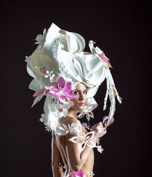 Paper hat fashion creation by Ukrainian artist Asya Kozina.