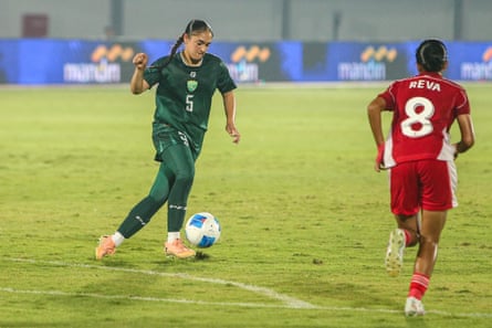 Pakistan’s Layla Aliya Banaras (left) dribbles the ball during the AFC Women’s Asian Cup 2026 qualifier against Indonesia in July 2025.