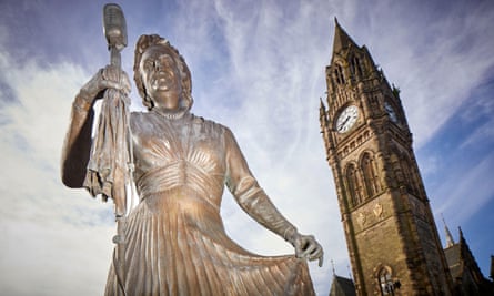 A statue of Gracie Fields in front of Rochdale town hall