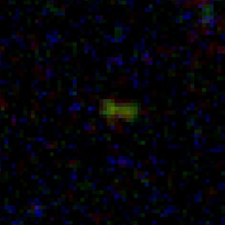 The glowing dog bone revealed by the James Webb telescope in the Advanced Deep Extragalactic Survey (JADES).