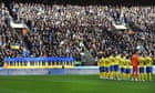 Premier League fans and clubs show support for Ukraine – video