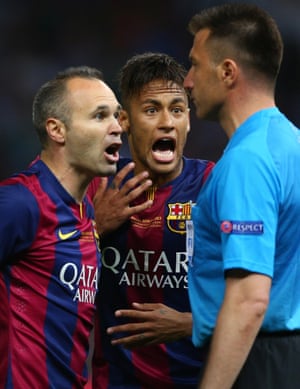 Andres Iniesta and Neymar of Barcelona confront the assistant referee who disallowed the goal.