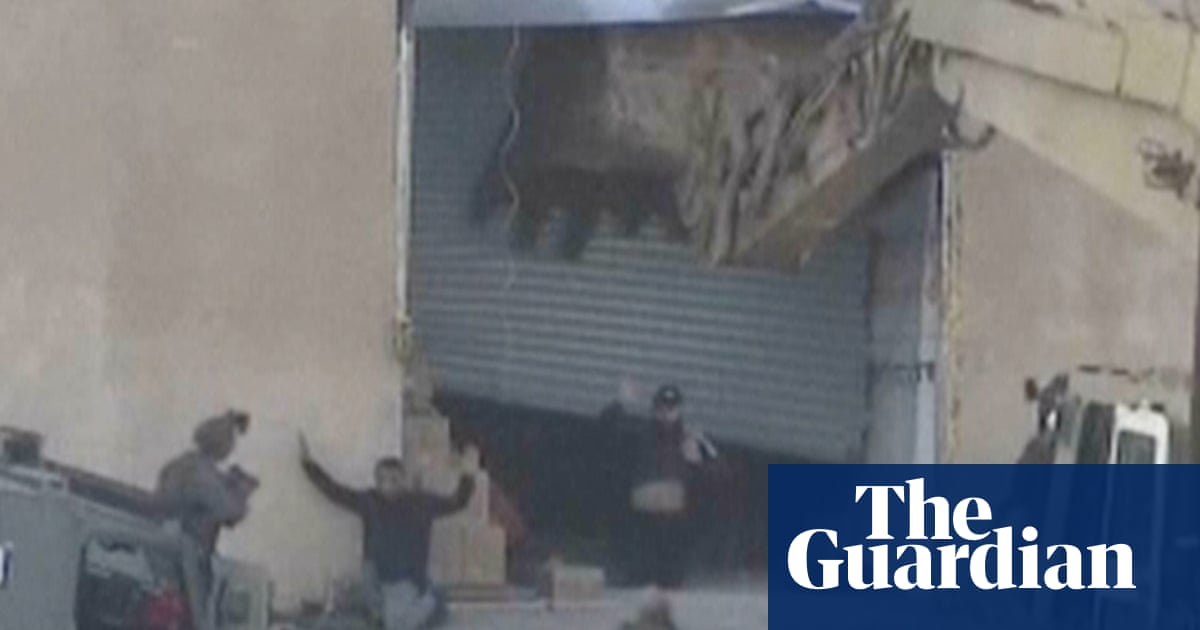 Moment Israeli forces shoot dead surrendered Palestinians – video report