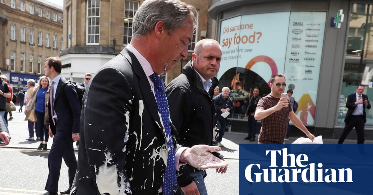 Nigel Farage hit by milkshake while campaigning in Newcastle – video