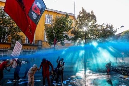 Protesters clash with police in central Tirana.