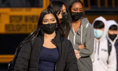 Students leave Washington-Liberty High School in Arlington county, one of several school districts that sued to stop Youngkin’s mask-optional order.