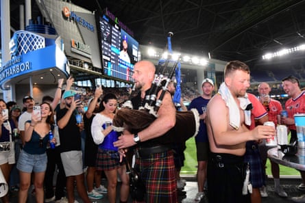 Members of the Tartan Army attend the Major League Baseball match between the Miami Marlins and Texas Rangers at LoanDepot Park