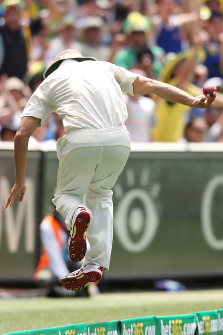 Nathan Coulter-Nile catches Kevin Pietersen but then stumbles over the boundary rope during day one of the fourth Test at Melbourne, 2013.