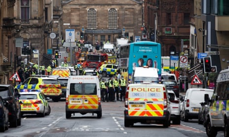 Police and emergency services at the scene of the attack in central Glasgow