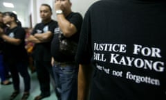 Supporters of Bill Kayong outside the court at the trial of three men charged in his murder.