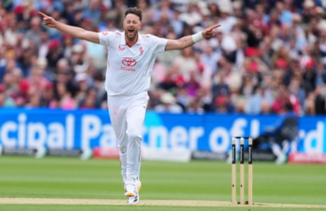England's Ollie Robinson celebrates taking his fifth wicket, the wicket of New Zealand's Matt Henry.