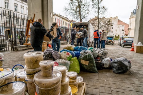 Volunteers unloading aid from various associations at the Humanitarian Aid Headquarters in Lviv.