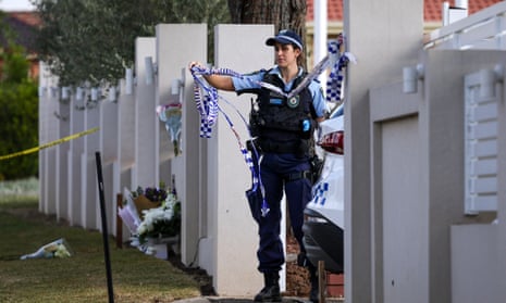 A police officer at the Christ the Good Shepherd church in Sydney's western suburb of Wakeley