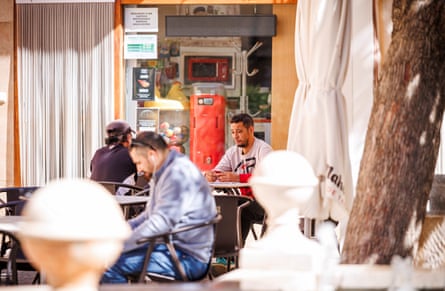 A few people sat at tables