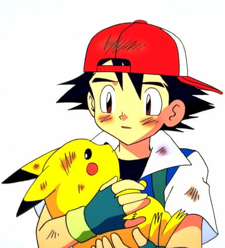 Ash Ketchum holds Pikachu.