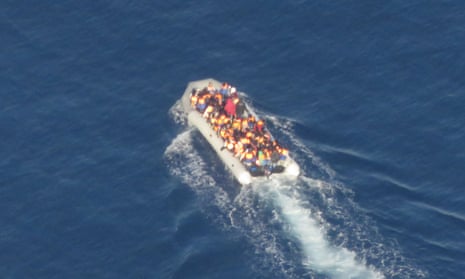 Refugees and migrants on a dinghy in the Mediterranean during Easter weekend