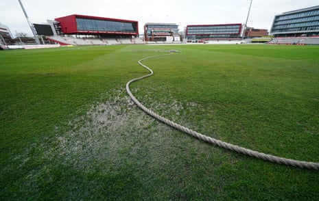 The wet outfield at Old Trafford.