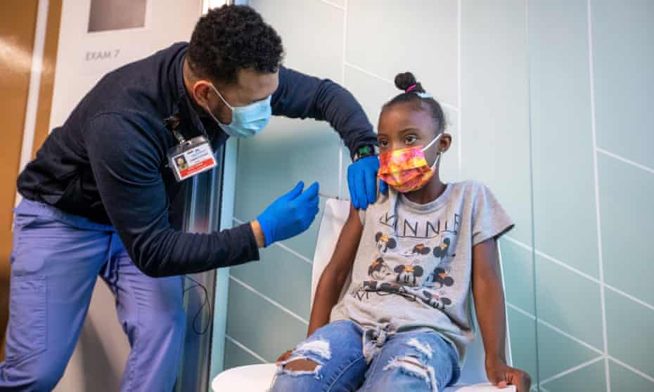 Nyla Varner, 9,  receives a vaccination at Kaiser Permanente Tustin Ranch Vaccination Clinic on 4 November 2021 in Tustin, California.