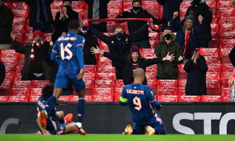 Arsenal’s Alexandre Lacazette celebrates scoring the first goal against Rapid Vienna in front of Gunners fans - 272 days after he scored the previous Emirates goal with fans present.