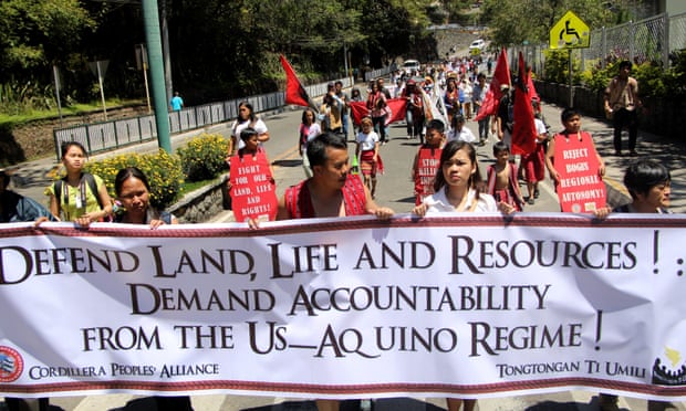 Indigenous activists, with women playing a prominent role, march in support of their rights at Baguio City on Luzon.