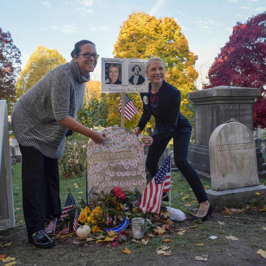 Women place 'I voted' stickers on the grave of women's suffrage leader Susan B Anthony in Rochester, New York.