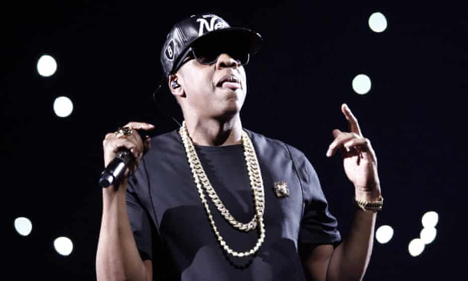Jay-Z performs during a concert as part of his tour Watch the Throne at Bercy in Paris