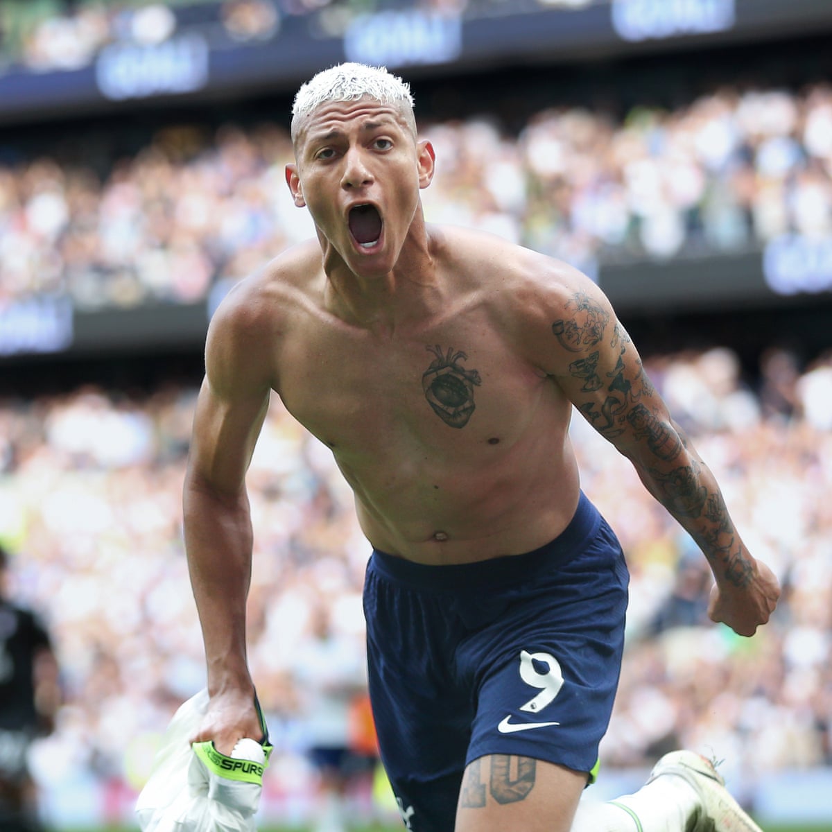 Richarlison of Tottenham Hotspur is pushed to the front of the News Photo - Getty Images