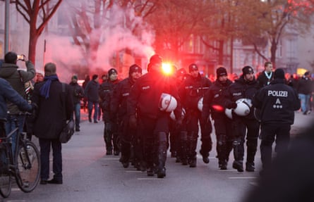 Police move into position before the 2. Bundesliga derby between St Pauli and Hannover 96.