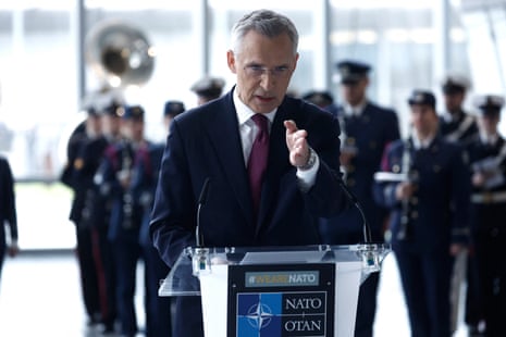 North Atlantic Treaty Organization (NATO) Secretary General Jens Stoltenberg gives a speech while international foreign ministers listen on.