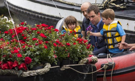 Brendan Cox, husband of Jo, and their two children Cuillin, five, and Lejla, three, prepare to join a floating commemoration.