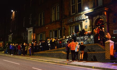 Queues outside The Harley at night