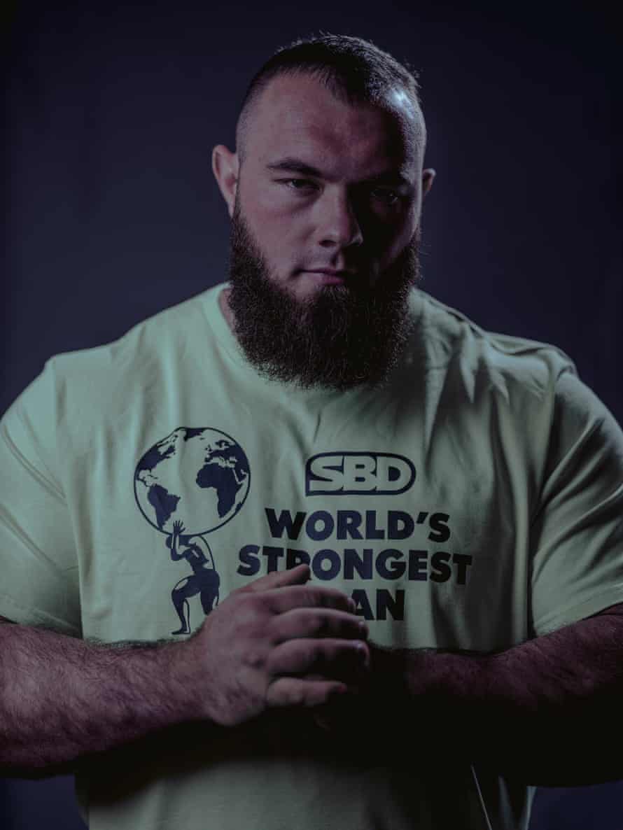 portrait -large man with beard and shirt that says SBD World’s Strongest Man