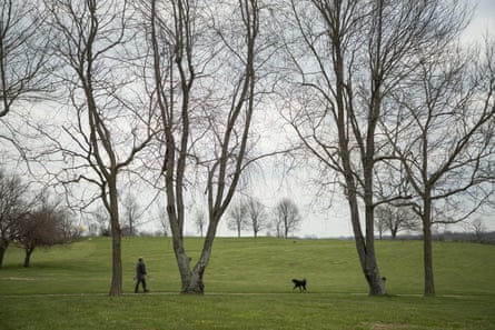 A visitor walks his dog on the grounds at Camp Nelson civil war park in Nicholasville, Kentucky, on 10 April 2018.