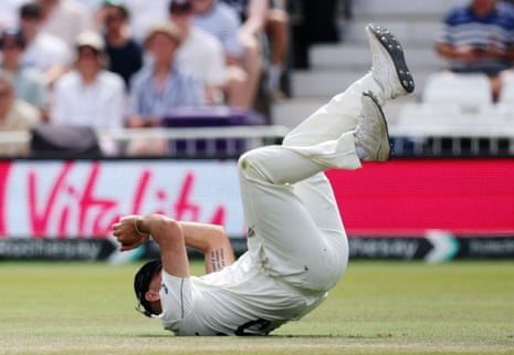 New Zealand's Daryl Mitchell falls after taking a catch to dismiss England's Jamie Smith off the bowling of Nathan Smith.
