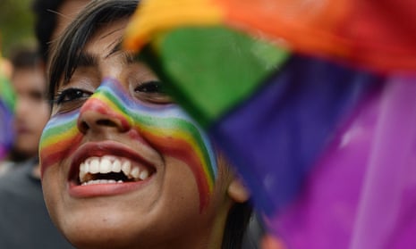 Woman with rainbow on her face