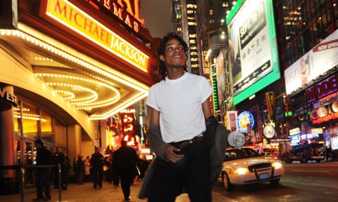 Jordan Neely is pictured before going to see the Michael Jackson movie This is It, outside the Regal Cinemas in Times Square in 2009. 