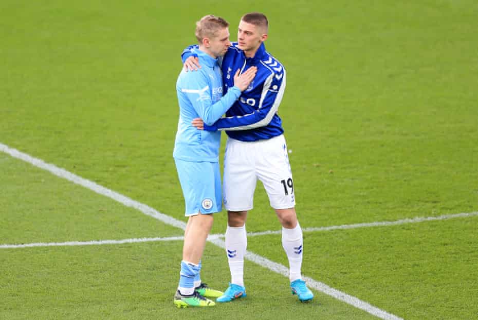 Oleksandr Zinchenko of Manchester City embraces fellow Ukrainian Vitalii Mykolenko of Everton