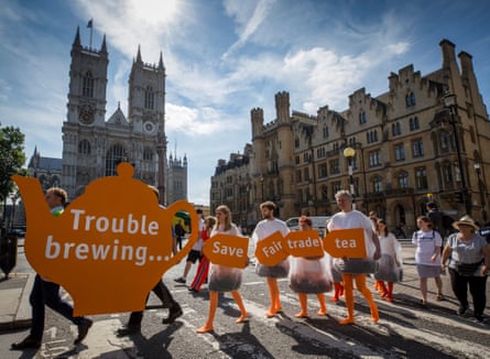 Human tea bags protest outside Sainsbury’s AGM.