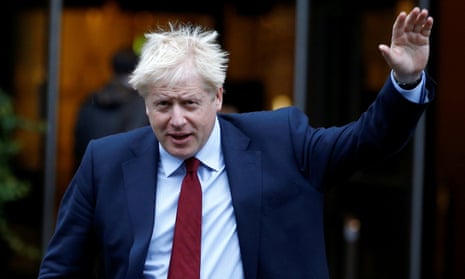 Boris Johnson is seen outside the venue for the Conservative party conference in Manchester.