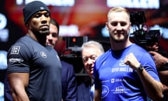 Anthony Joshua and Otto Wallin face off at a press conference.