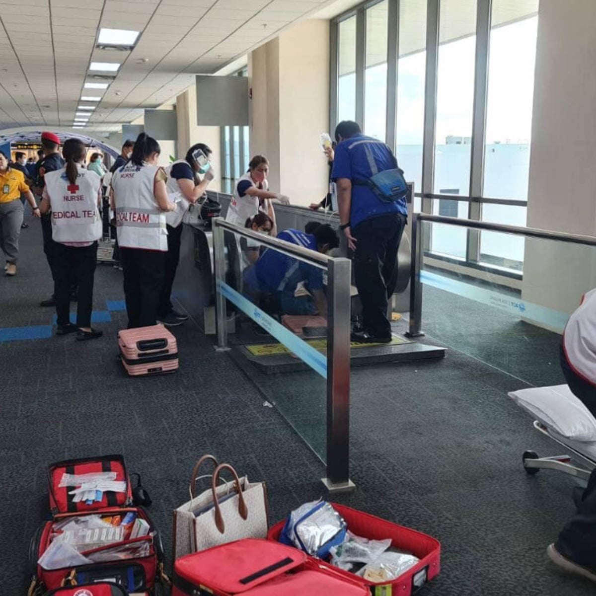 Woman's leg amputated at Bangkok airport after getting stuck in moving  walkway | Thailand | The Guardian
