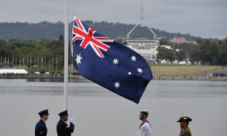 The flag is raised during the citizenship ceremony in Canberra on 26 January 2022. 
