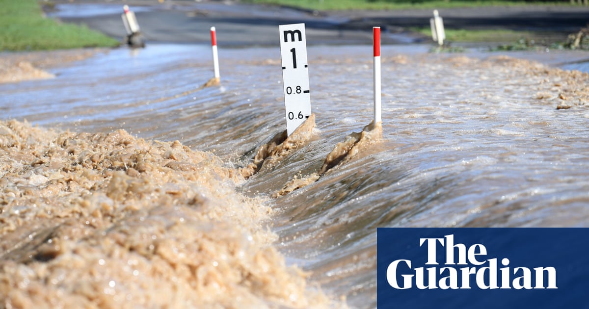 South-west Queensland towns brace for flooding as police declare emergency - The Guardian