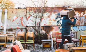 Man Carrying Chair At Flohmarkt Am Mauerpark.