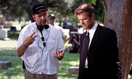 Alan Ball (left) speaks to the actor Peter Krause on the set of Six Feet Under.