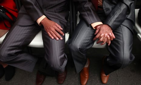 Gay men holding hands