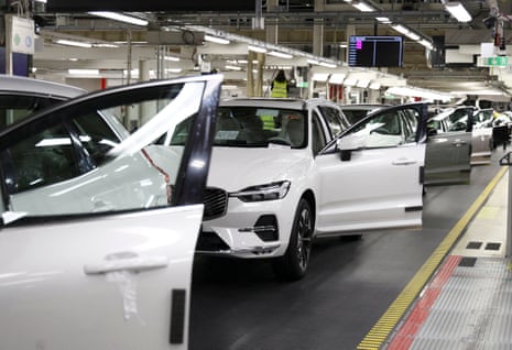 Volvo Cars' upcoming flagship car, the mid-sized Volvo electric SUV EX60, roll off the assembly line in Gothenburg, Sweden, 22 April.